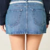 Minifalda pantalón vaquera con lazo de encaje