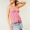 Minifalda pantalón vaquera de talle bajo con bordado de estrellas