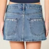 Minifalda pantalón vaquera de talle bajo con lazo bordado