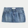 Minifalda pantalón vaquera de talle bajo con lazo bordado