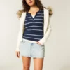 Minifalda pantalón vaquera de talle bajo y lavado claro