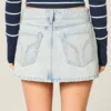 Minifalda pantalón vaquera de talle bajo y lavado claro