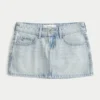 Minifalda pantalón vaquera de talle bajo y lavado claro