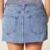 Minifalda pantalón vaquera de talle bajo y lavado medio