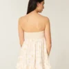 Minivestido babydoll sin tirantes con volantes