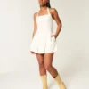 Minivestido con cintura baja y cuello halter