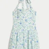 Minivestido con cintura baja y cuello halter