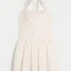 Minivestido con cintura baja y cuello halter