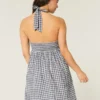 Minivestido halter con espalda abierta