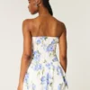 Minivestido sin tirantes con volantes