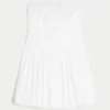 Minivestido sin tirantes con volantes