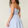 Minivestido sin tirantes de punto con cintura baja