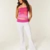Pantalones acampanados con cintura cruzada y estampado de hibiscos