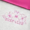 Pantalones acampanados con cintura cruzada y estampado de hibiscos
