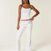 Pantalones acampanados con cintura cruzada y estampado numérico