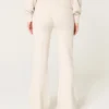 Pantalones acampanados con cintura doblada y tejido de punto de Gilly Hicks