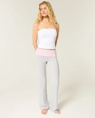 Pantalones acampanados de punto con cintura plegada