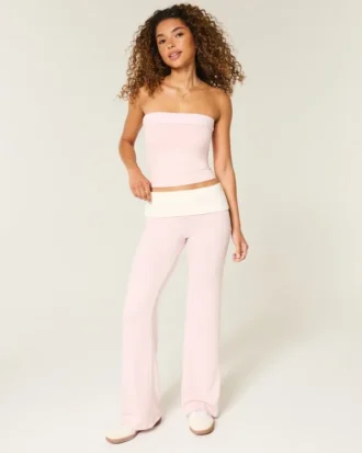Pantalones acampanados de punto con cintura plegada