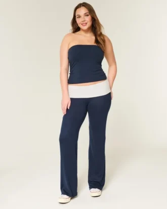 Pantalones acampanados de punto con cintura plegada