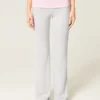 Pantalones acampanados de punto con cintura plegada Pantalones acampanados de punto con cintura plegada
