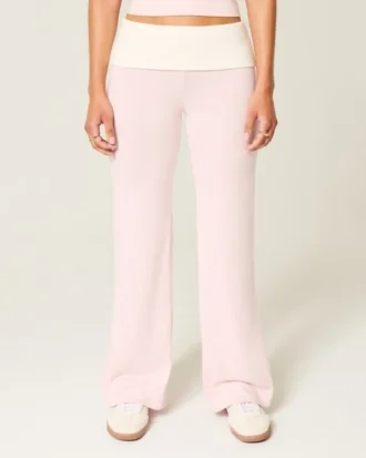 Pantalones acampanados de punto con cintura plegada