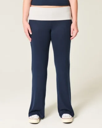 Pantalones acampanados de punto con cintura plegada