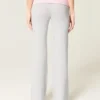 Pantalones acampanados de punto con cintura plegada Pantalones acampanados de punto con cintura plegada