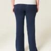 Pantalones acampanados de punto con cintura plegada
