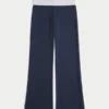 Pantalones acampanados de punto con cintura plegada