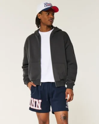Pantalones cortos de felpa hasta la mitad del muslo con gráfico de los UConn Huskies