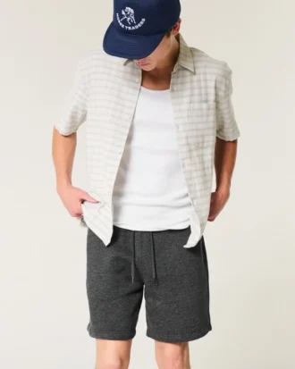 Pantalones cortos de felpa por encima de la rodilla con icono