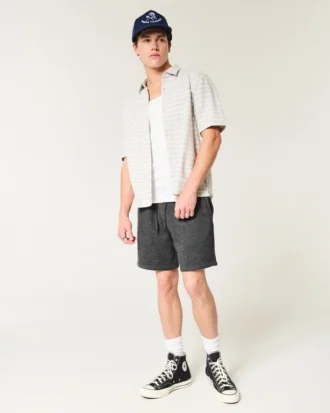 Pantalones cortos de felpa por encima de la rodilla con icono