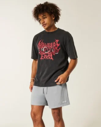 Pantalones cortos de fútbol de punto con logotipo hasta la mitad del muslo