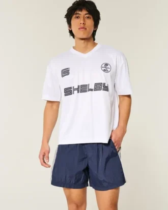 Pantalones cortos de fútbol holgados hasta la mitad del muslo
