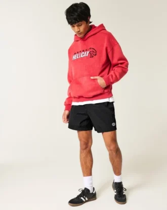 Pantalones cortos de fútbol holgados hasta la mitad del muslo