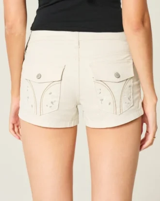 Pantalones cortos de popelín con bolsillo trasero floral y talle bajo