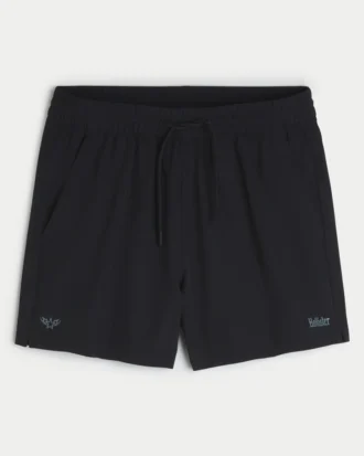 Pantalones cortos deportivos con logotipo a media pierna