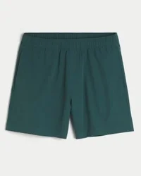 Pantalones cortos híbridos deportivos hasta la mitad del muslo