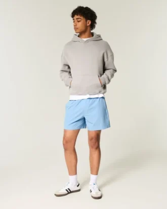 Pantalones cortos híbridos deportivos hasta la mitad del muslo