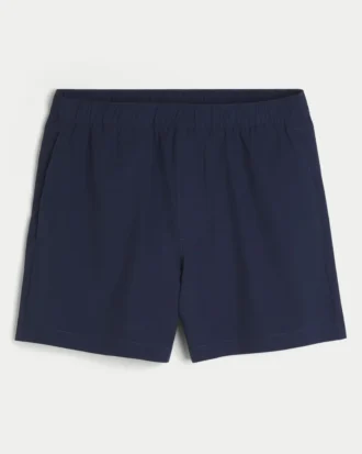Pantalones cortos híbridos deportivos hasta la mitad del muslo