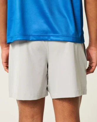 Pantalones cortos híbridos deportivos hasta la mitad del muslo