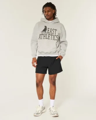Pantalones cortos híbridos deportivos hasta la mitad del muslo