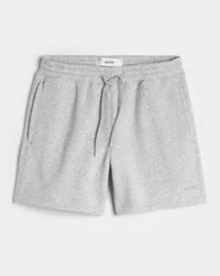 Pantalones cortos holgados de felpa hasta la mitad del muslo