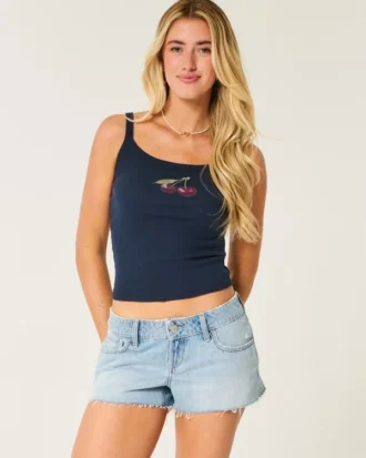 Pantalones cortos vaqueros mini de talle ultra bajo, lavado medio y rotos