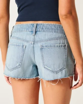 Pantalones cortos vaqueros mini de talle ultra bajo, lavado medio y rotos