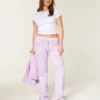 Pantalones de chándal acampanados con estampado de camuflaje Pantalones de chándal acampanados con estampado de camuflaje