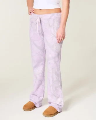 Pantalones de chándal acampanados con estampado de camuflaje