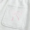 Pantalones de chándal anchos con estampado de lazo