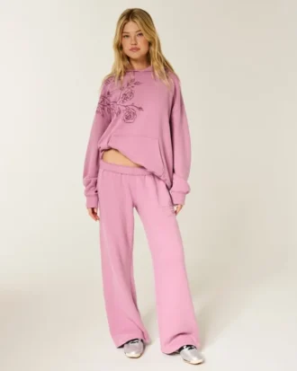 Pantalones de chándal anchos con estampado de rosas brillantes