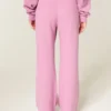 Pantalones de chándal anchos con estampado de rosas brillantes